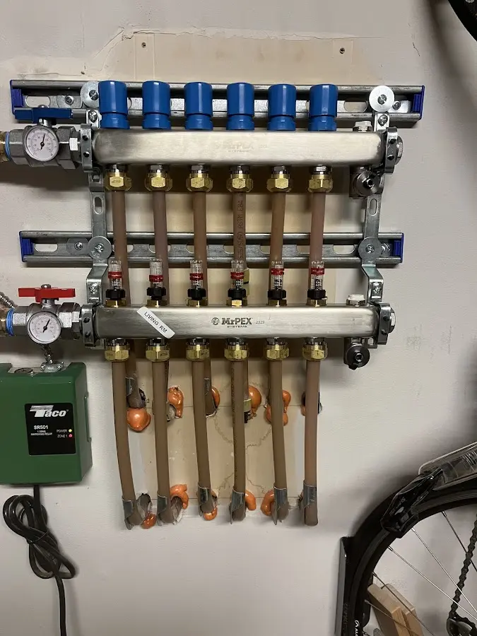 Plumber performing Water Heater Repair at a residential property in Martin